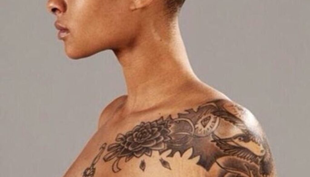 Dark skinned tattoo on shoulder